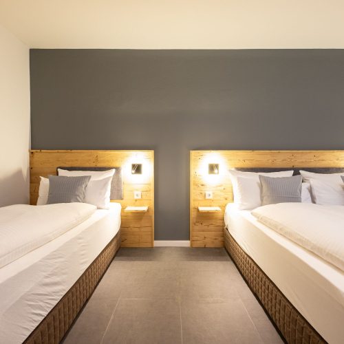 Einzelbett und Doppelbett in Ferienwohnung in Garmisch-Partenkirchen