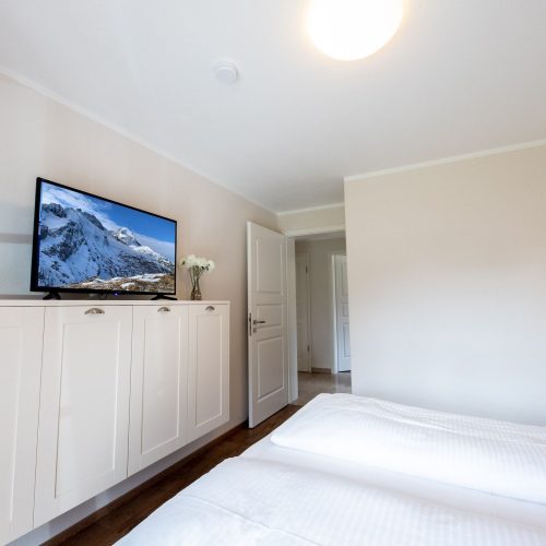 Doppeltet mit Fernseher in Ferienwohnung in Garmisch-Partenkirchen