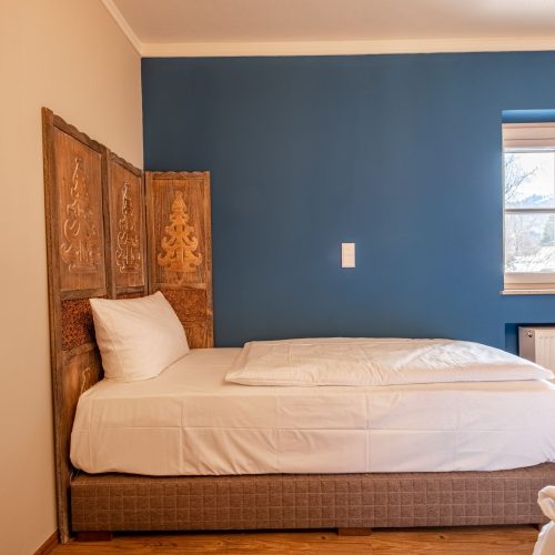 Schlafzimmer mit einem Einzelbett in Ferienwohnung in Garmisch-Partenkirchen