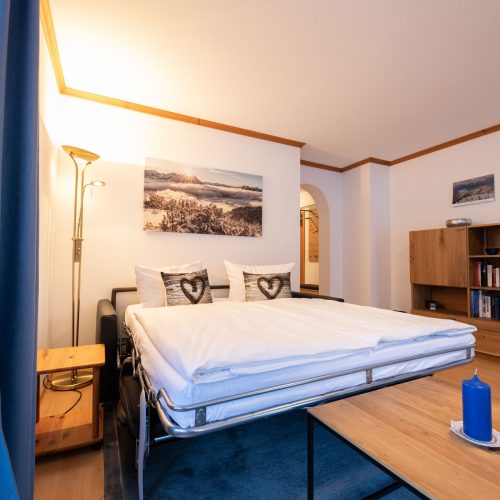 Schlaf-/Wohnbereich in Ferienwohnung in Garmisch-Partenkirchen